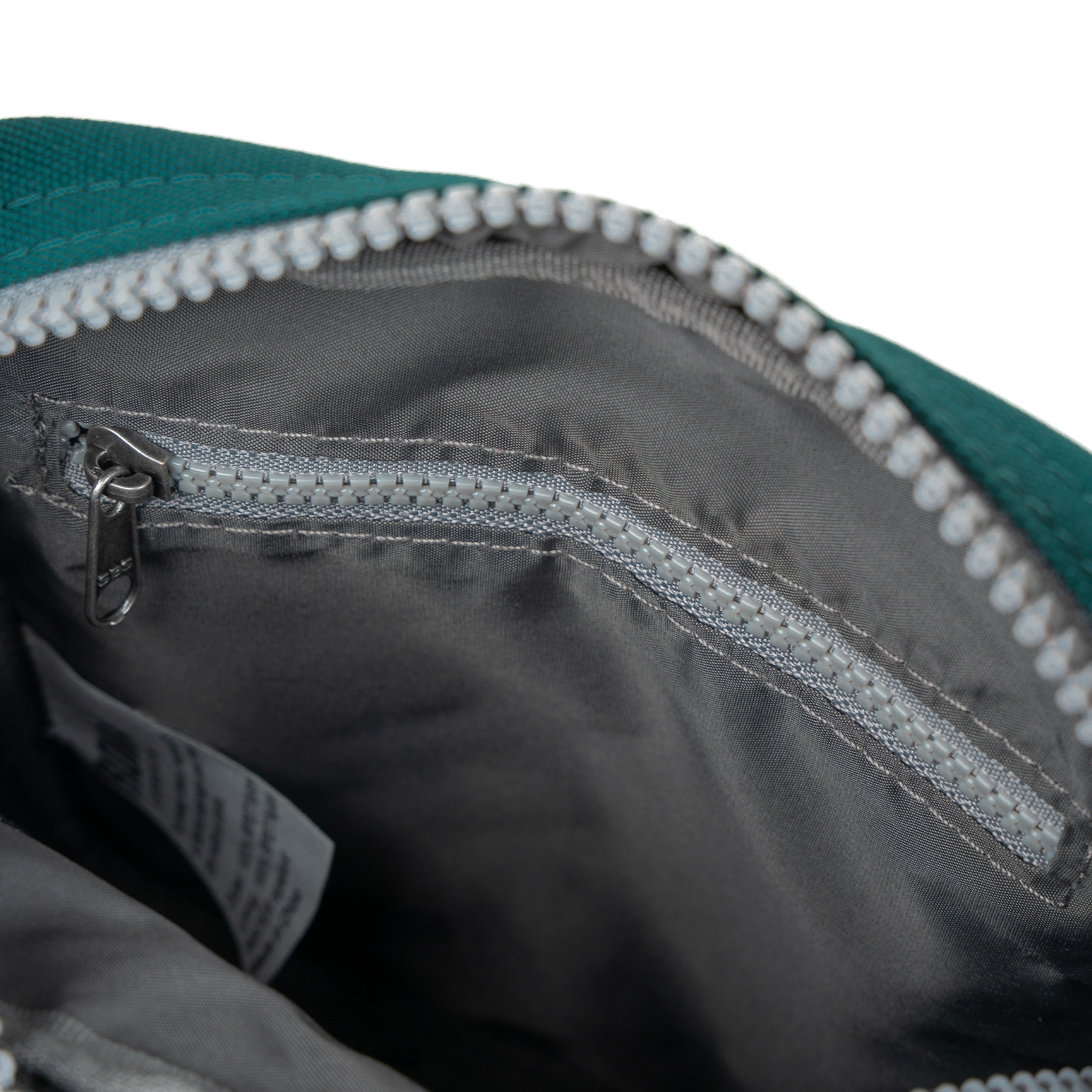 Bond Recycled Canvas Crossbody Bag from Roka London for sale at CAHM.