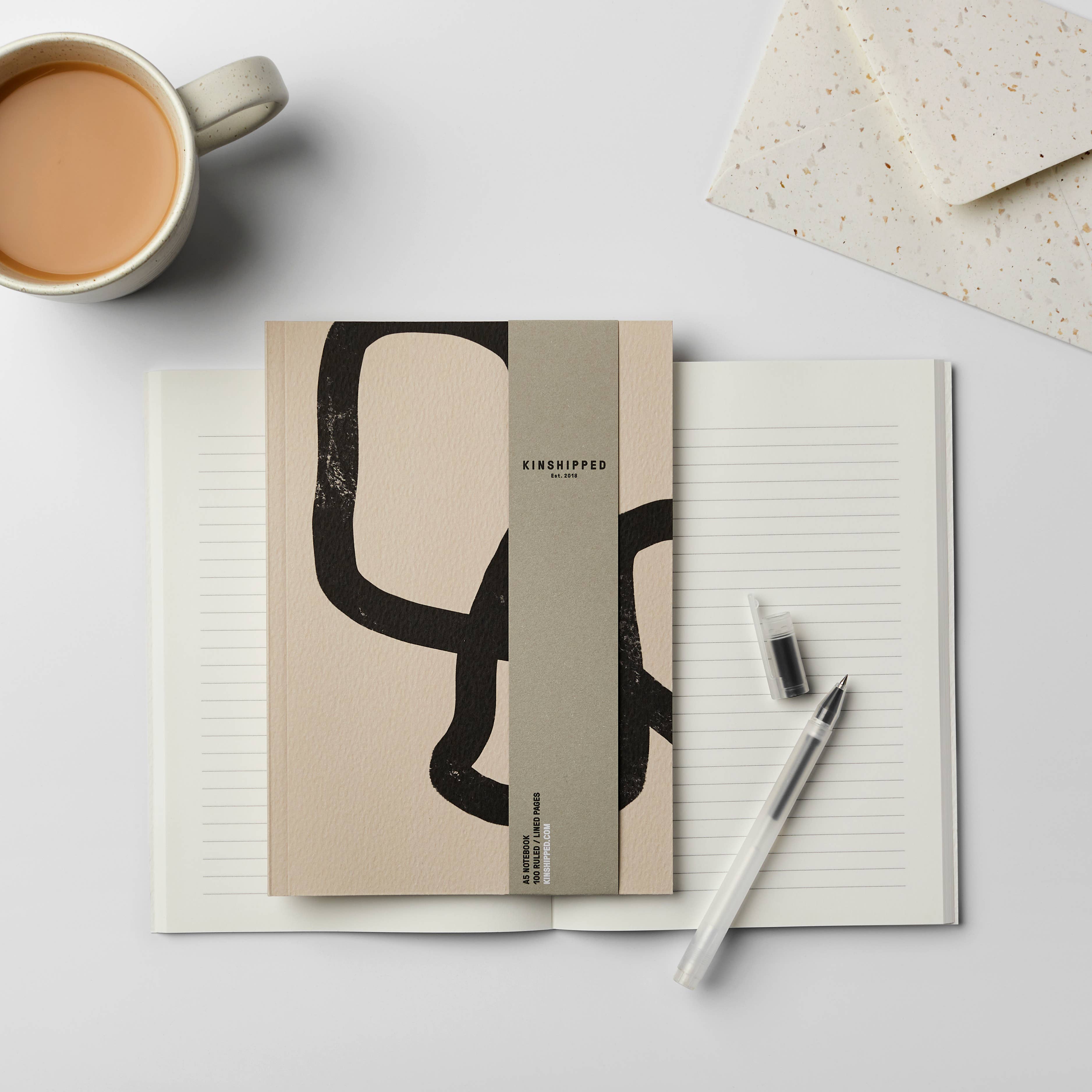 Kinshipped Squiggle notebook flat lay