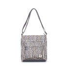 ROKA London Kennington Crossbody Bag in Linear Dot Canvas — front view