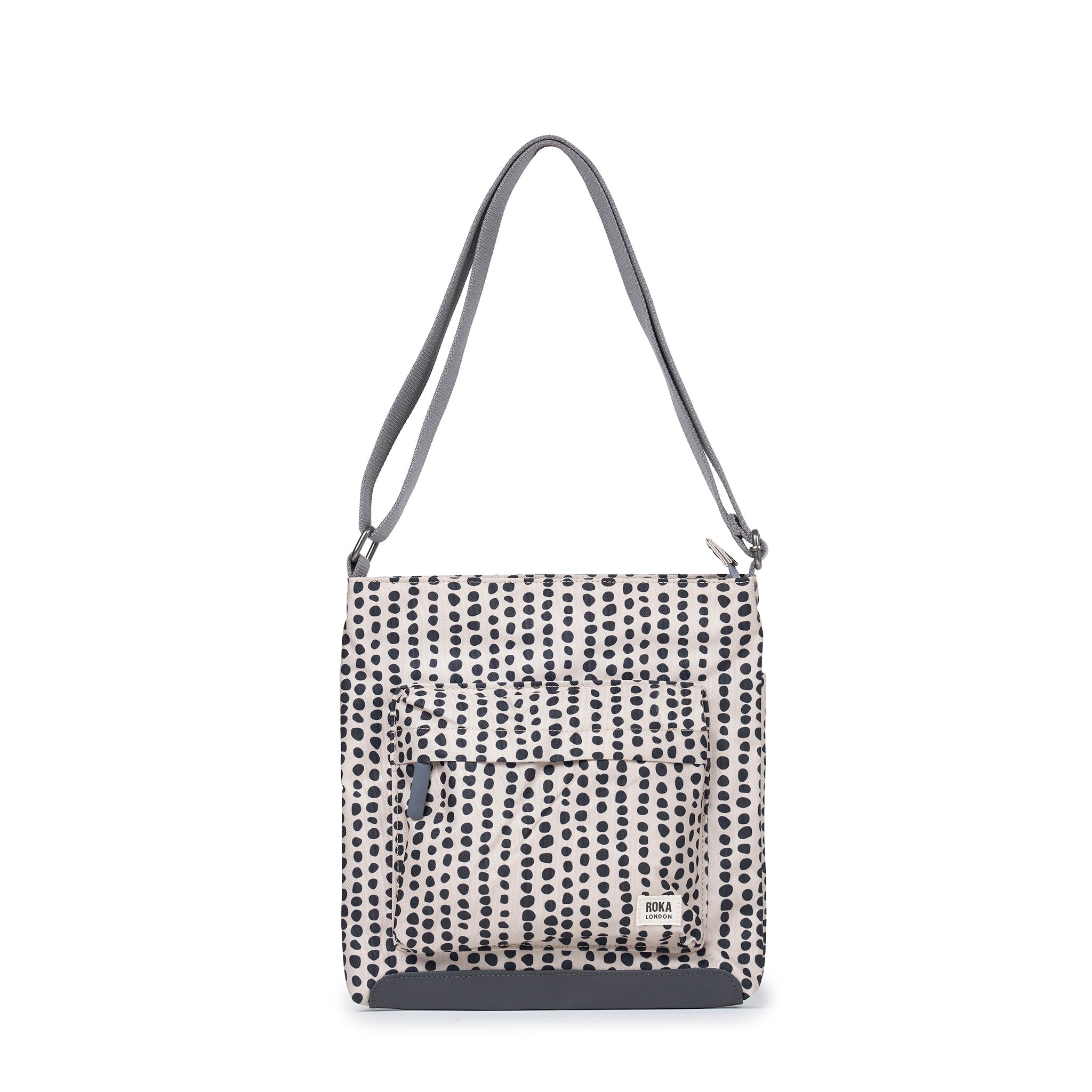ROKA London Kennington Crossbody Bag in Linear Dot Canvas — front view