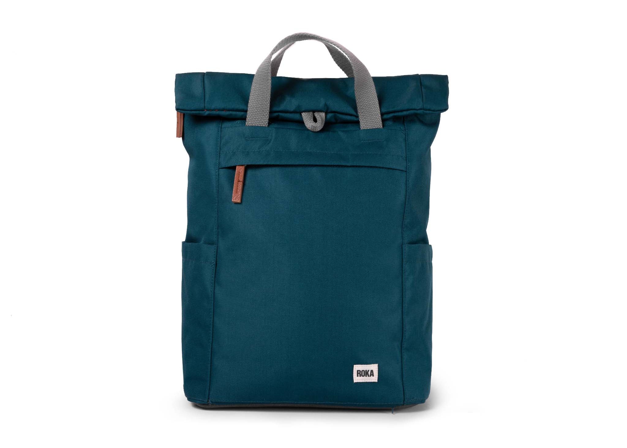 Teal backpack with gray handle on a white background