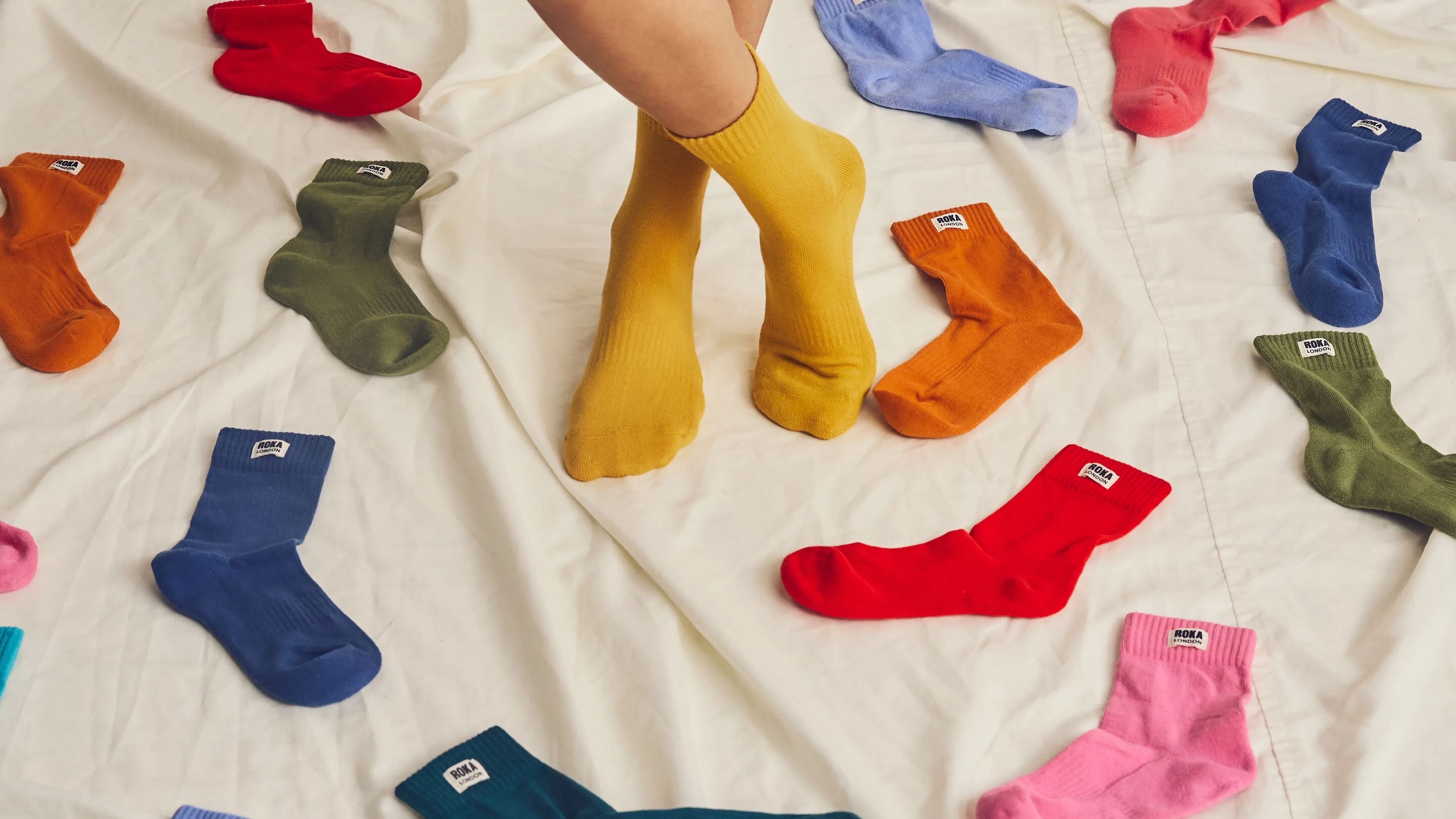 ROKA London Wimbledon Men's Organic Cotton Crew Socks — all colours flatlay