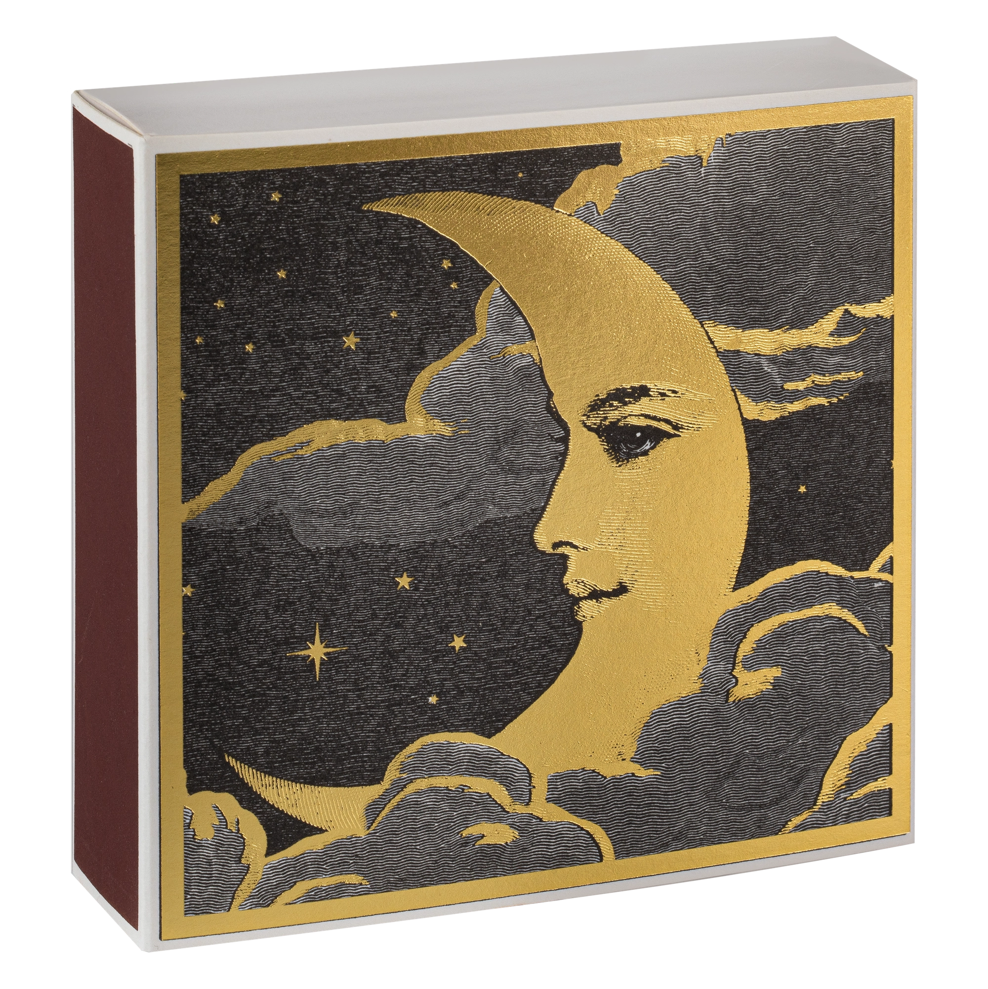 Decorative box with gold moon and face design on a black background