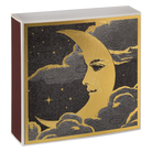 Decorative box with gold moon and face design on a black background