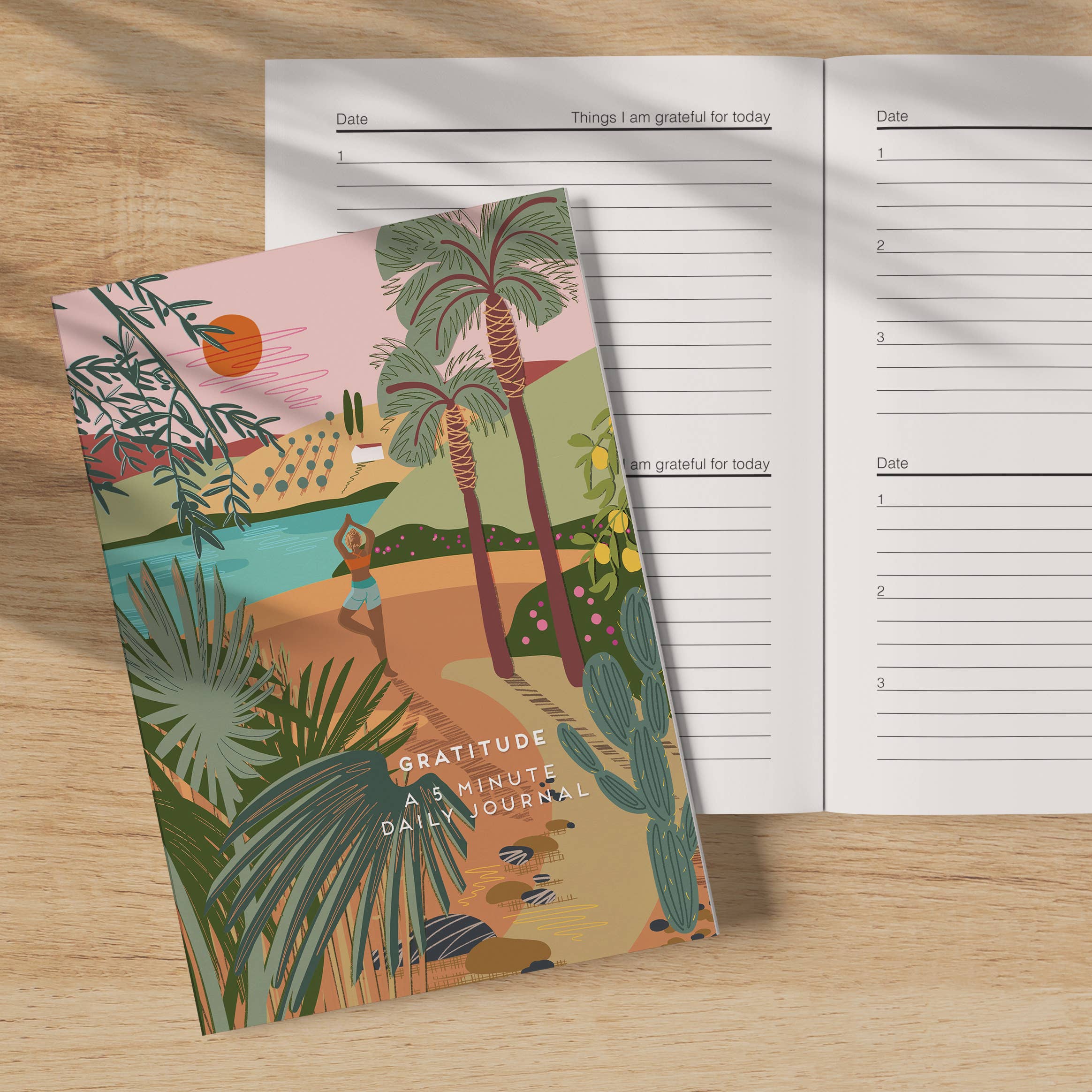 Onneke Gratitude Journal open pages showing entry prompts