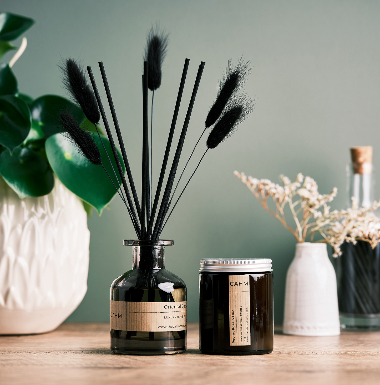 A Reed Diffuser and Candle Gift Set from the luxury fragrance collection by The CAHM Collective.