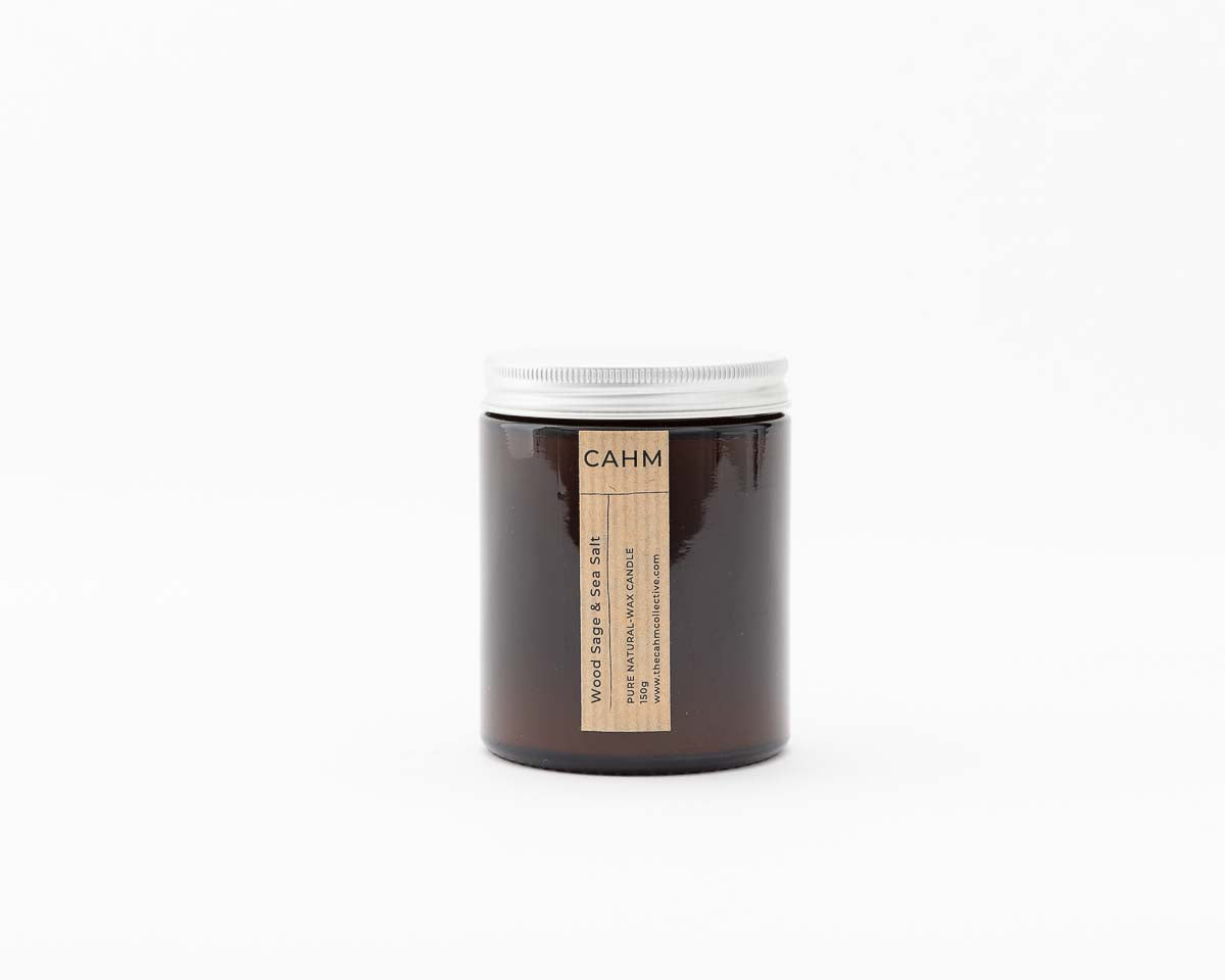 A Wood Sage and Sea Salt Candle from the Amber Jar Candle collection by The CAHM Collective.