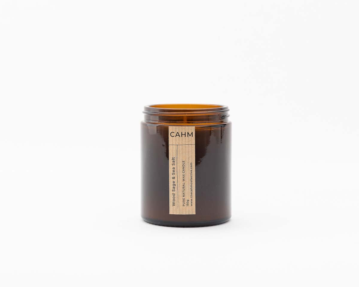 A Wood Sage and Sea Salt Candle from the Amber Jar Candle collection by The CAHM Collective.