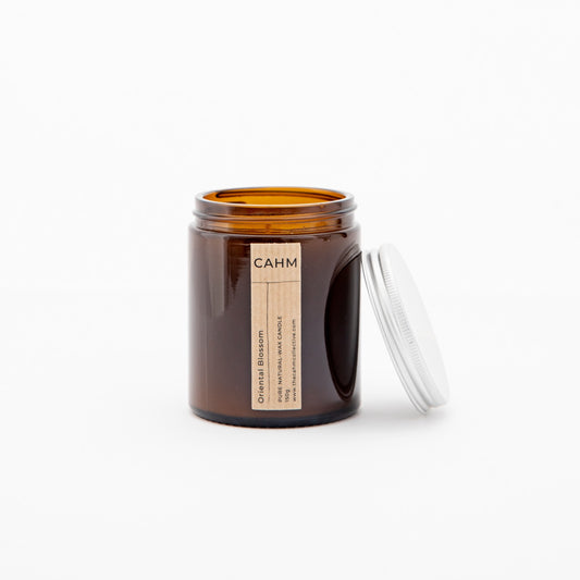 An Oriental Blossom Candle from the Amber Jar Candle collection by The CAHM Collective.